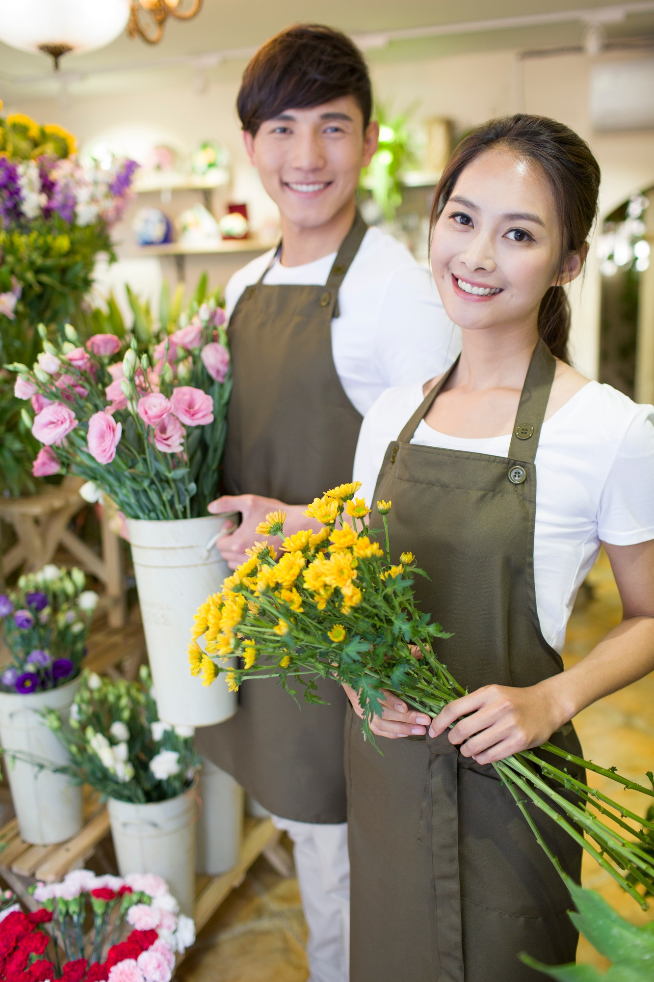 Florists working in shop
