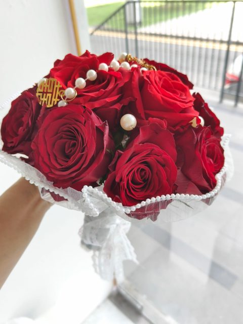 Love in full bloom! Our "Crimson Blessing" bouquet, adorned with the symbol of double happiness. ❤️